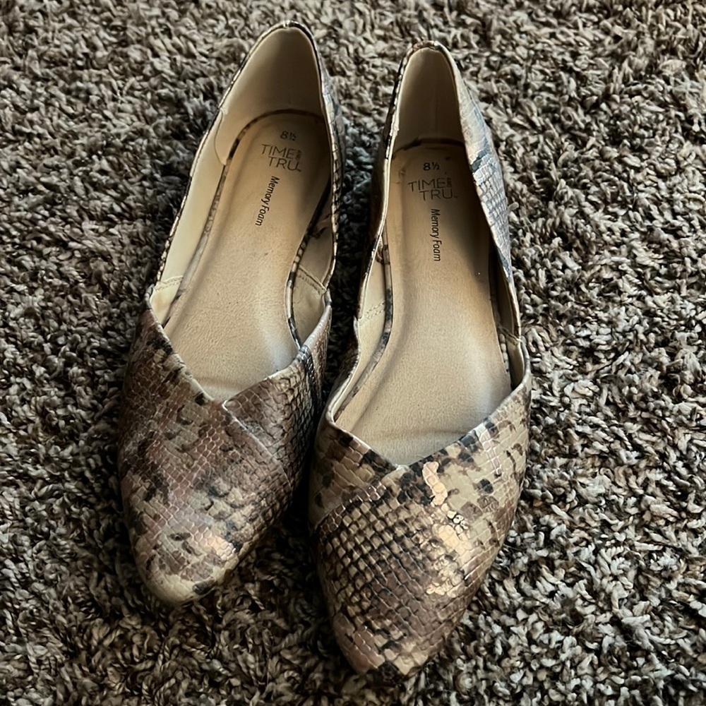 Snake skin, brown flats.
